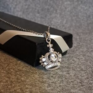 Silver Crown Pendant Necklace with Gemstone Accents